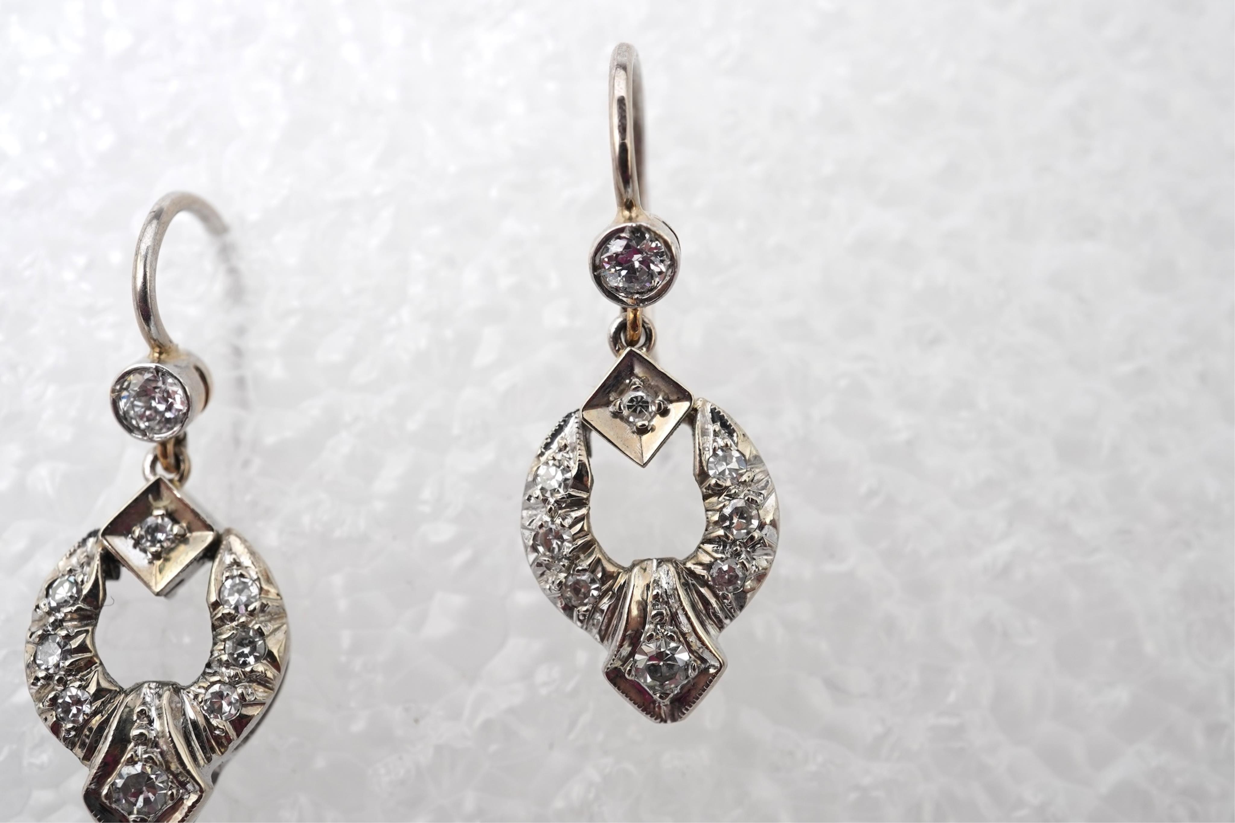 A pair of diamond earrings, mid 20th century and later